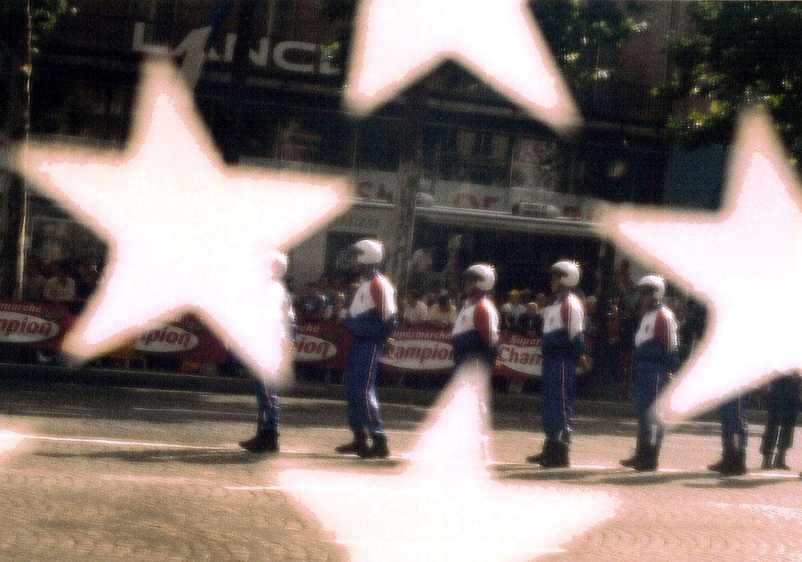 motorcycle stuntfolks thru US flag