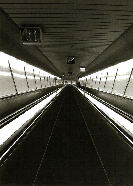 looking waaaay down a metro escalator