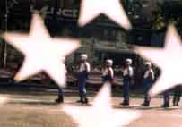 motorcycle stuntfolks thru US flag