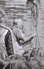 Fisherman checking his nets