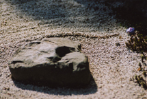 Somehow I do not think the purple sparkly rock is a monks touch