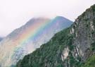 Misty mountains produce waif-like rainbows