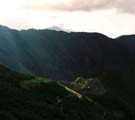 Machu Picchu spotlit from the Sun Gate