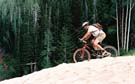 Jim riding the last patch of snow